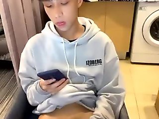 Korean youngster strokes off a little cock